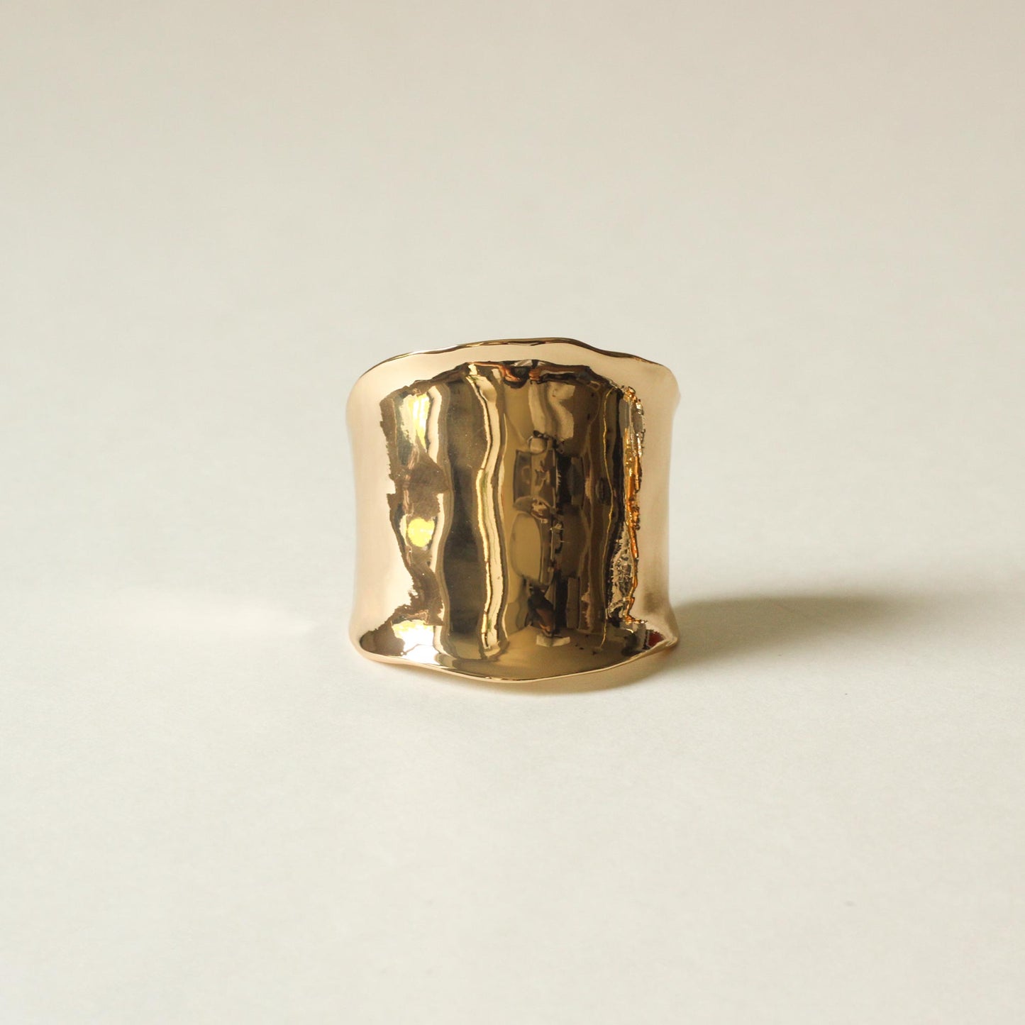 gold hair cuff holder with polished finish