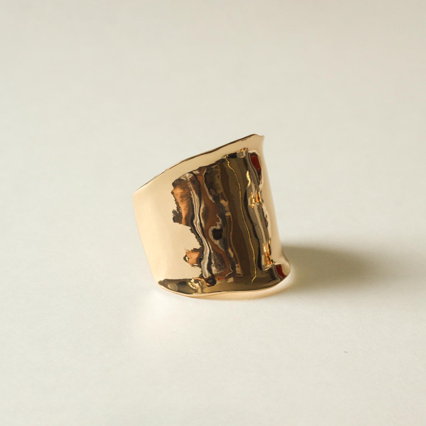 gold textured hair cuff holder