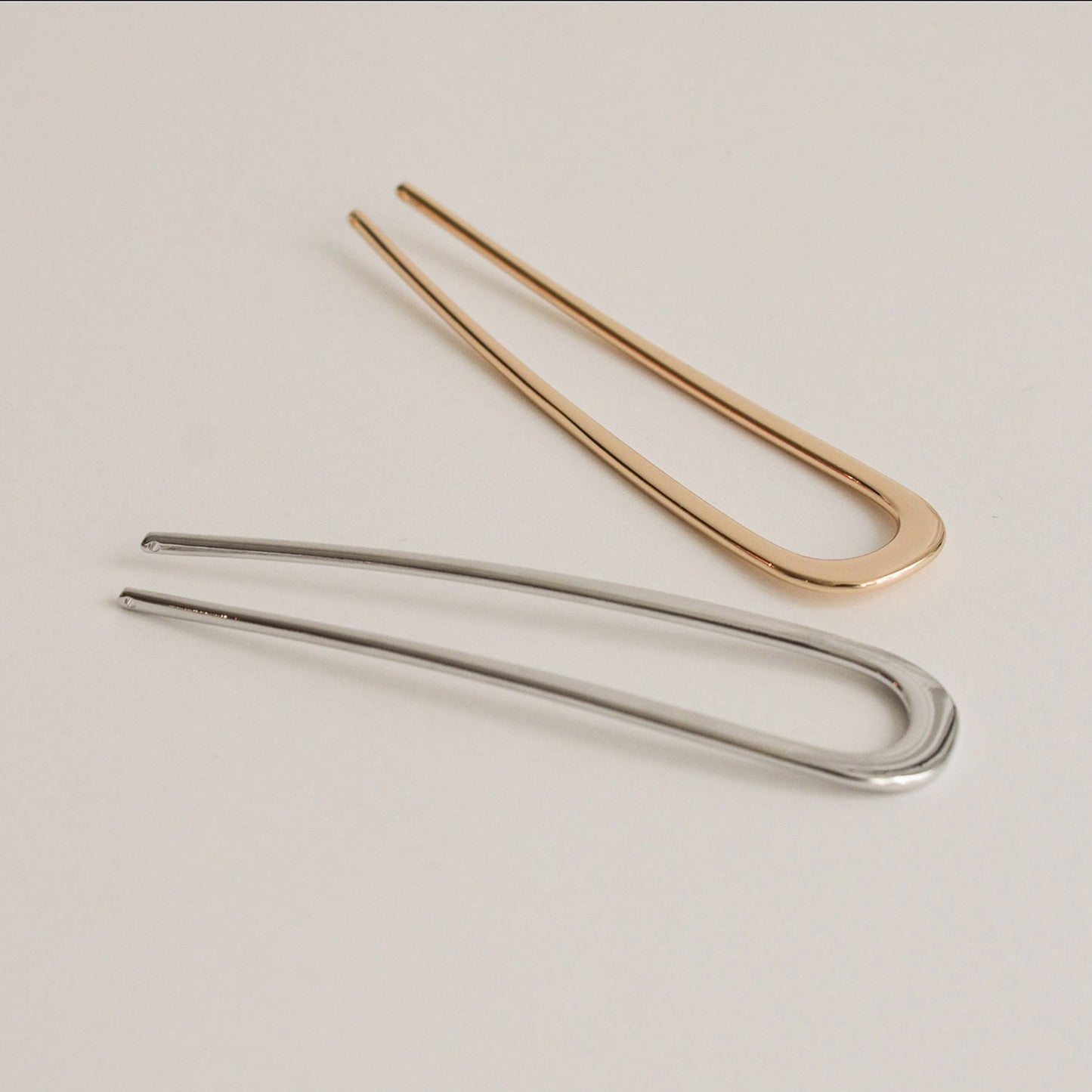 gold and silver u-shaped hair sticks made of alloy