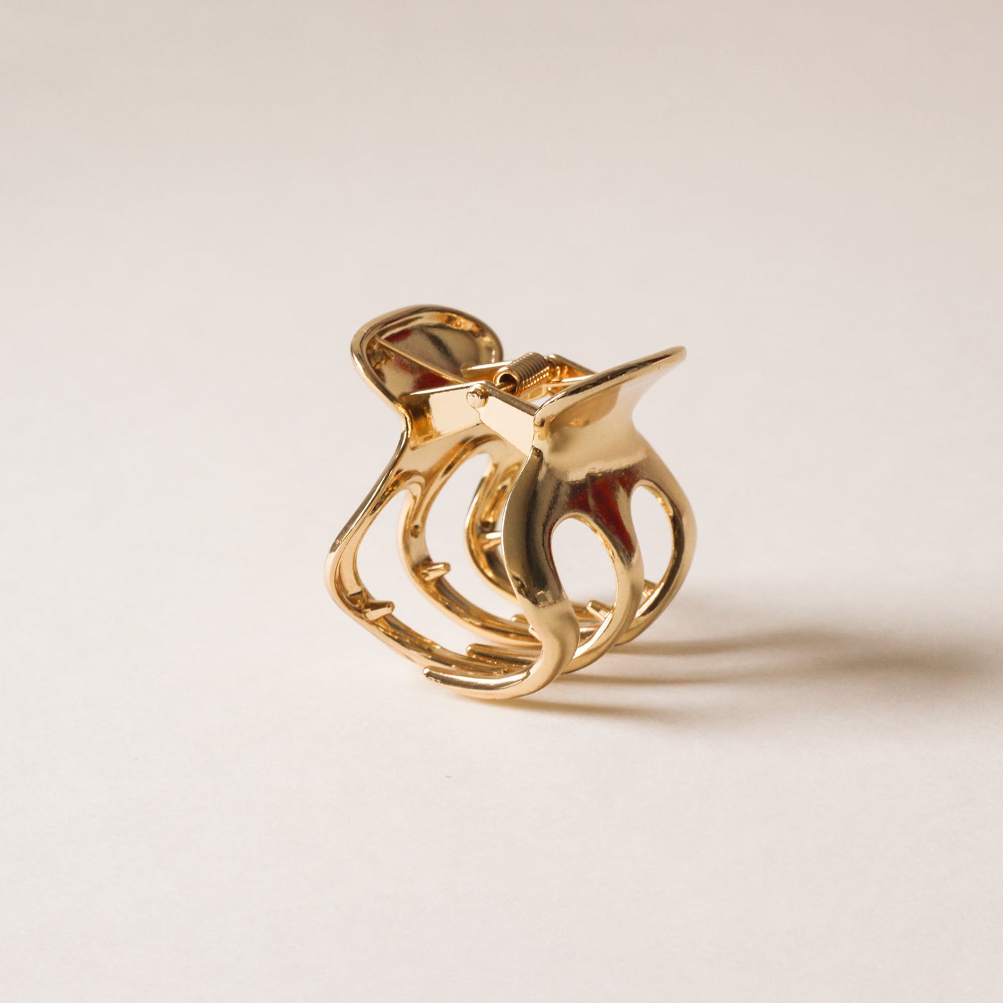 polished gold metal claw clip