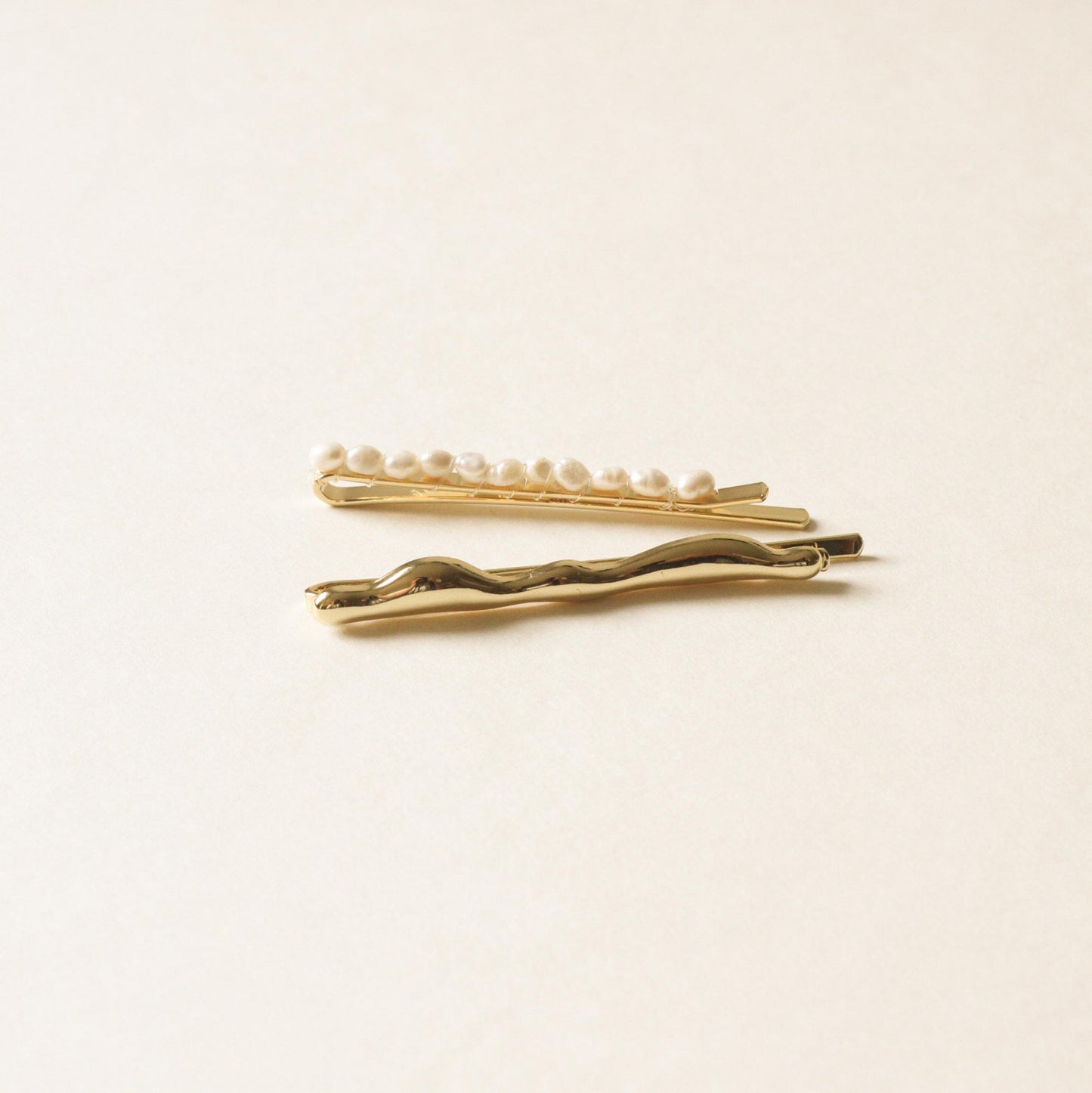 freshwater pearl bead pin and textured sleek metal pin