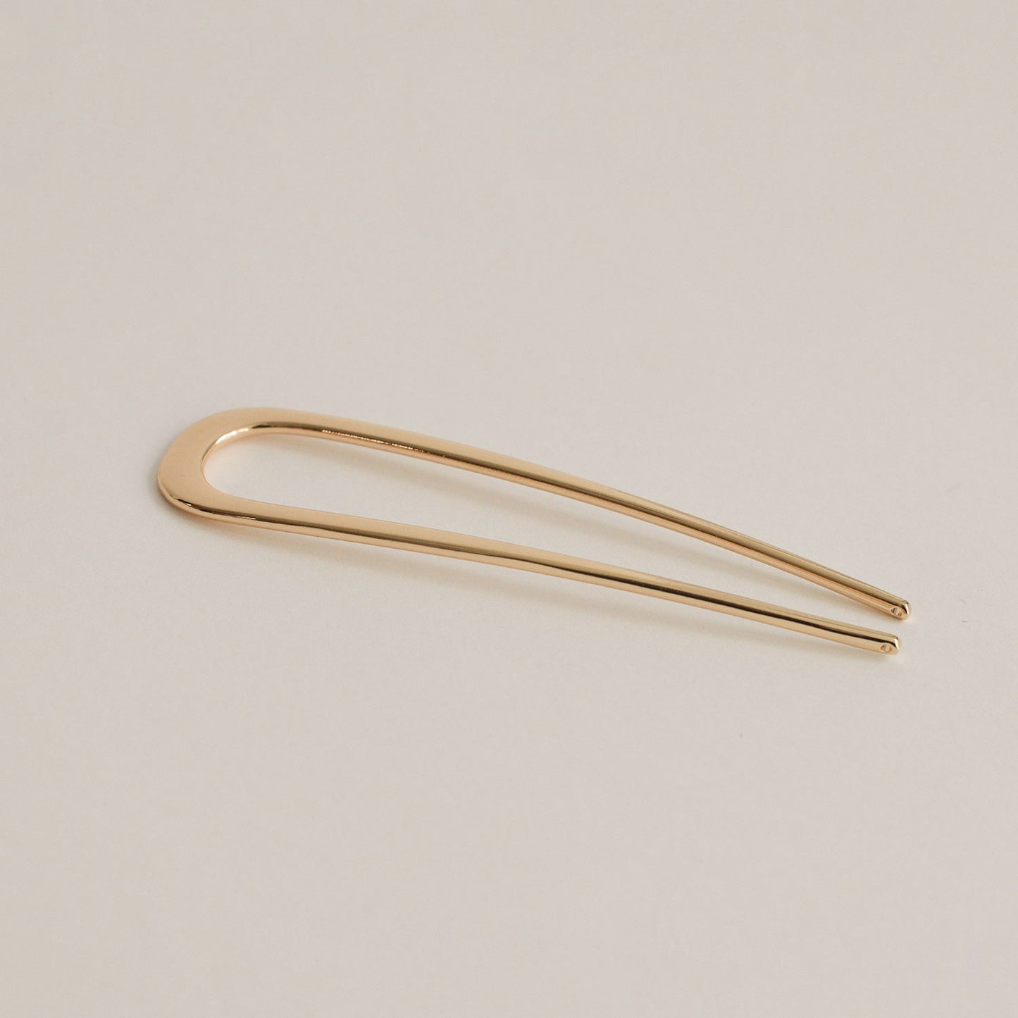 bent u-shaped gold hair stick made of alloy
