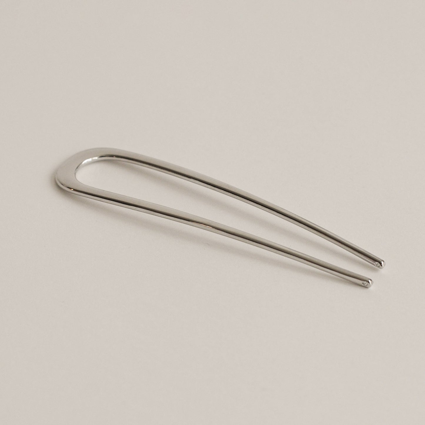 minimal bent u-shaped hair stick colored silver