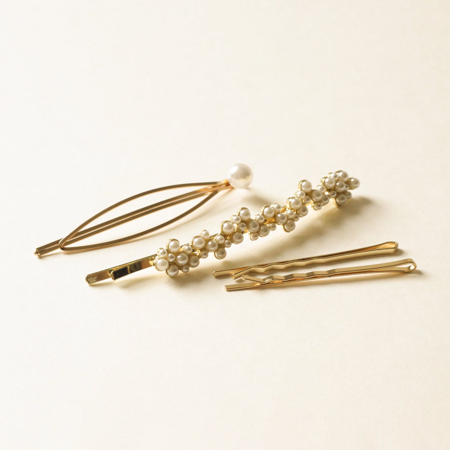 metal bobby pins and with pearl beads