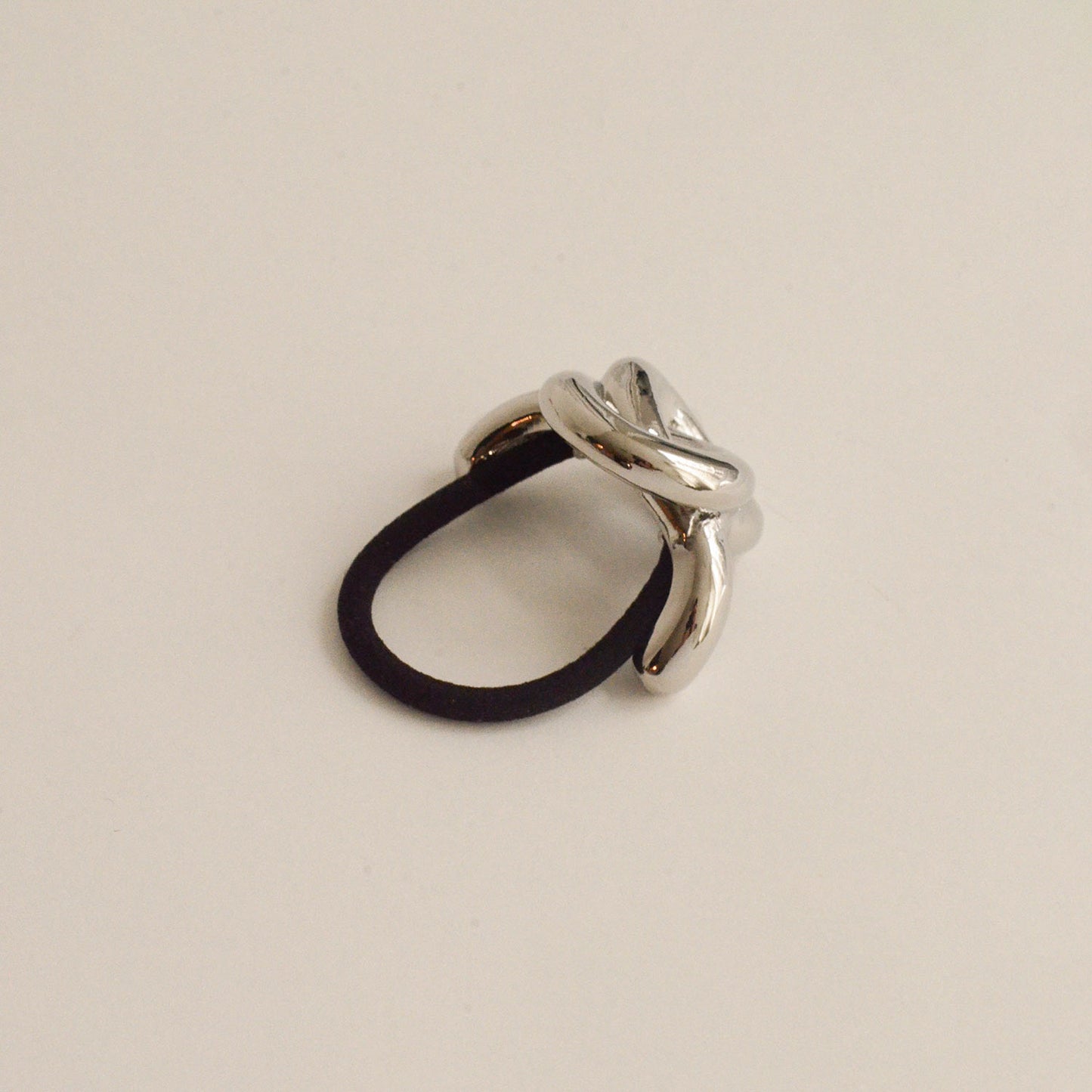 a hair cuff tie with silver eternal loop