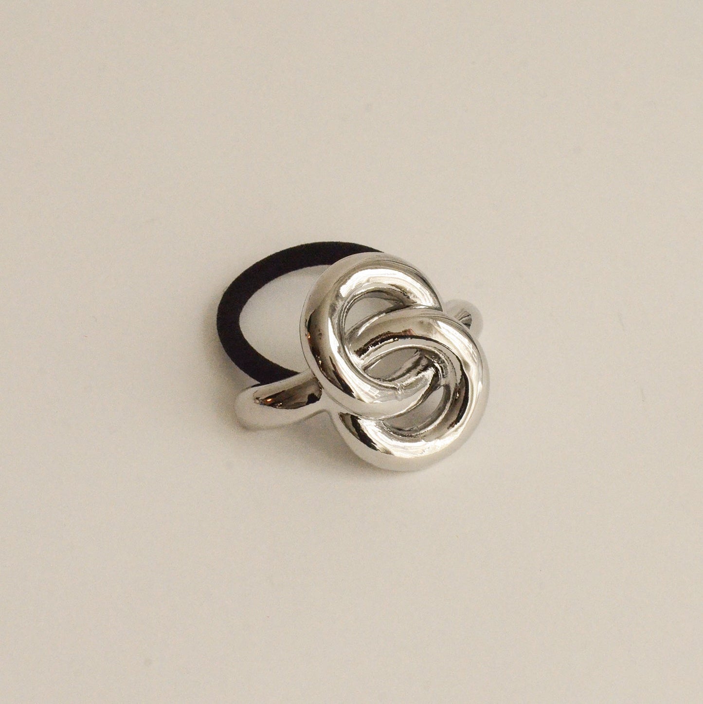 Ponytail hair tie with silver eternal loop