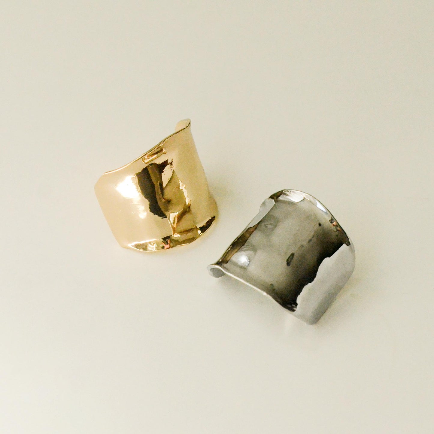 two textured metal cuff hair holders