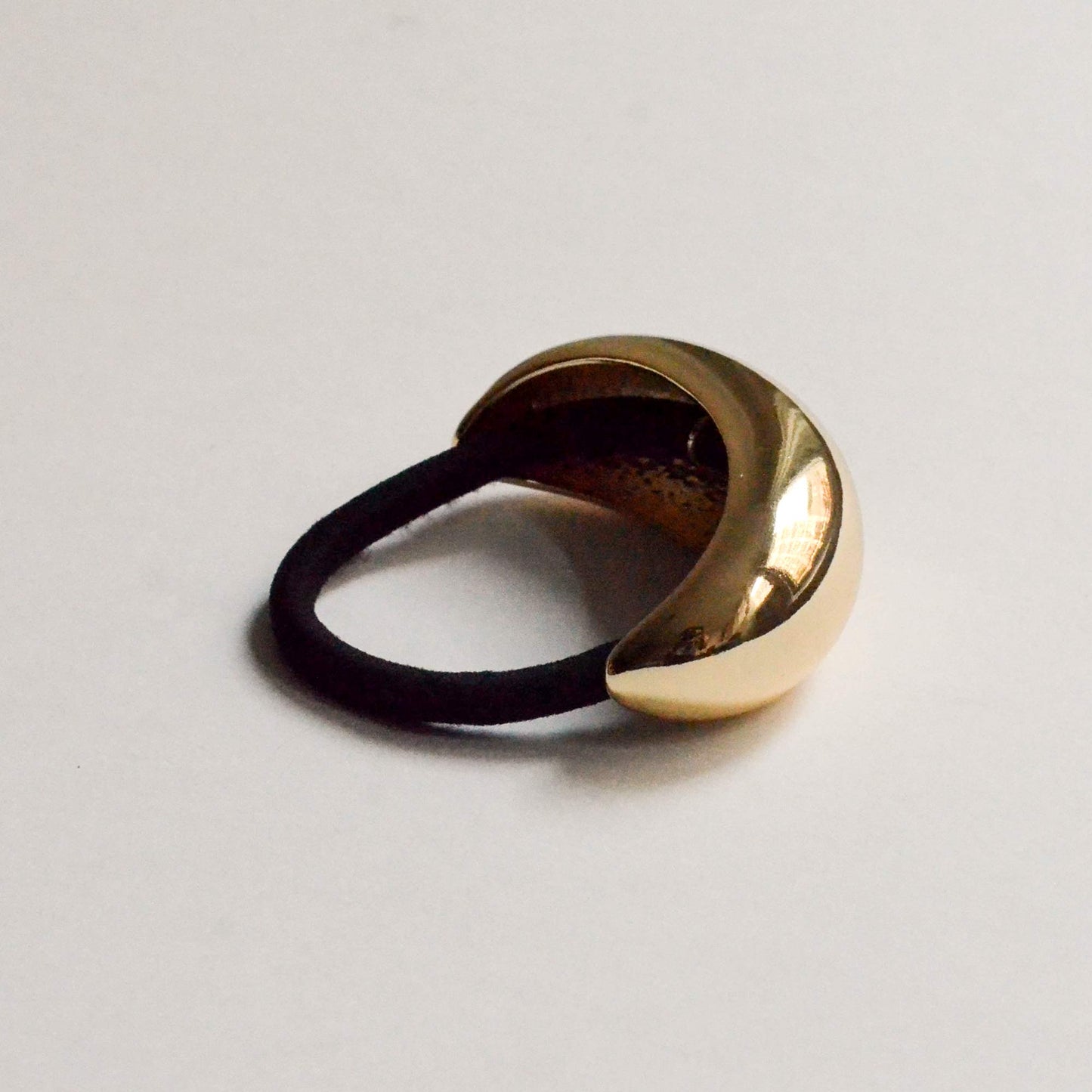 Hair cuff tie with a wide crescent design in gold