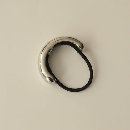 top view of silver cuff hair tie