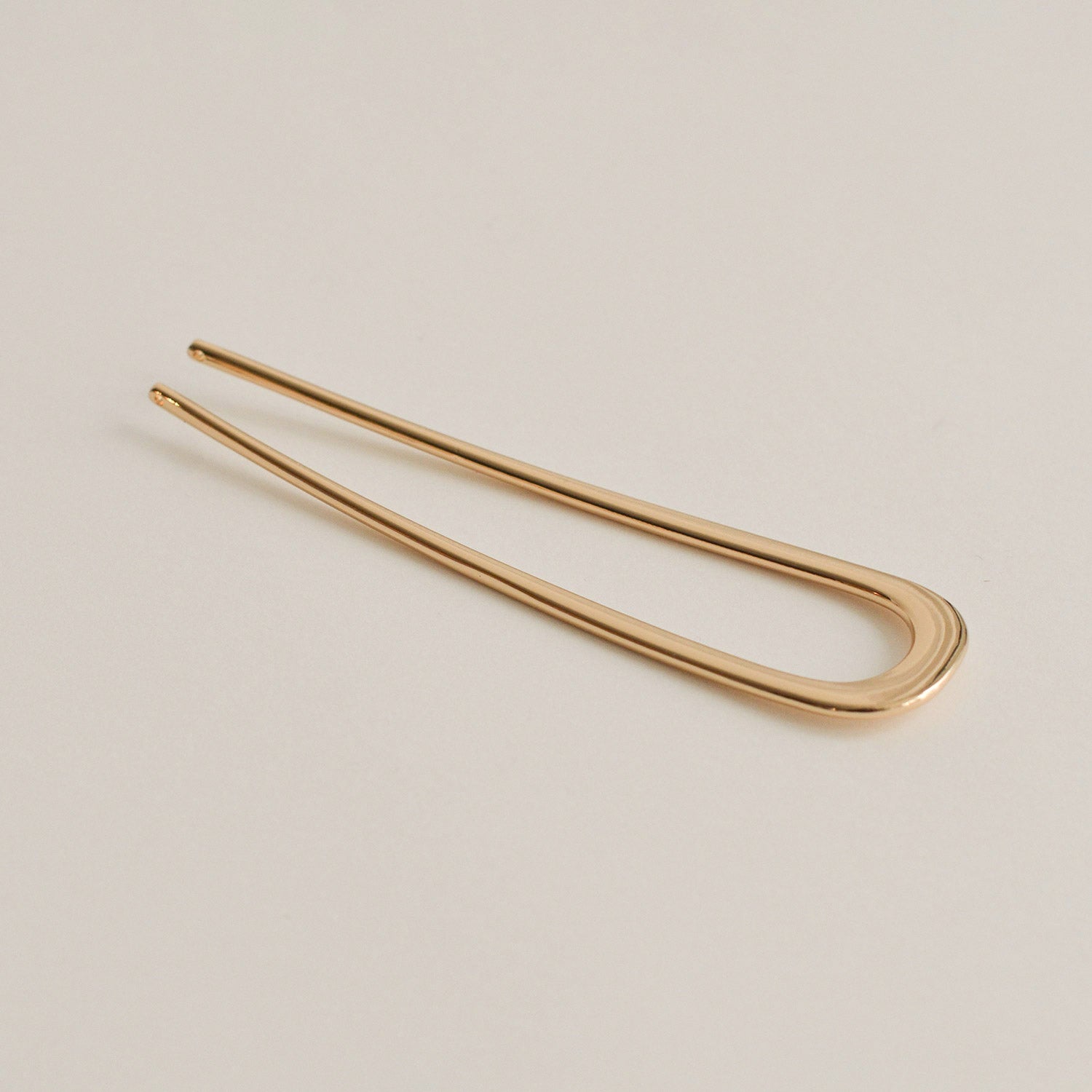 bent u-shaped hair stick colored gold