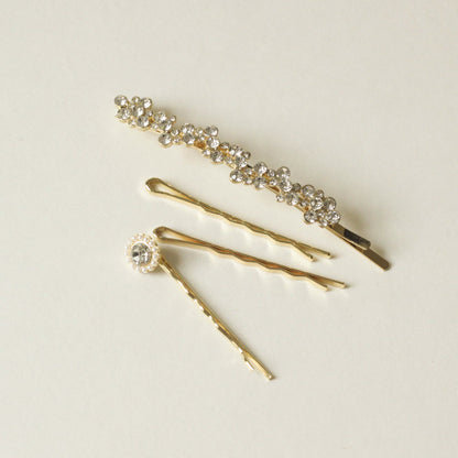 set of 4 pieces: rhinestone bobby pins and sleek metal bobby pins