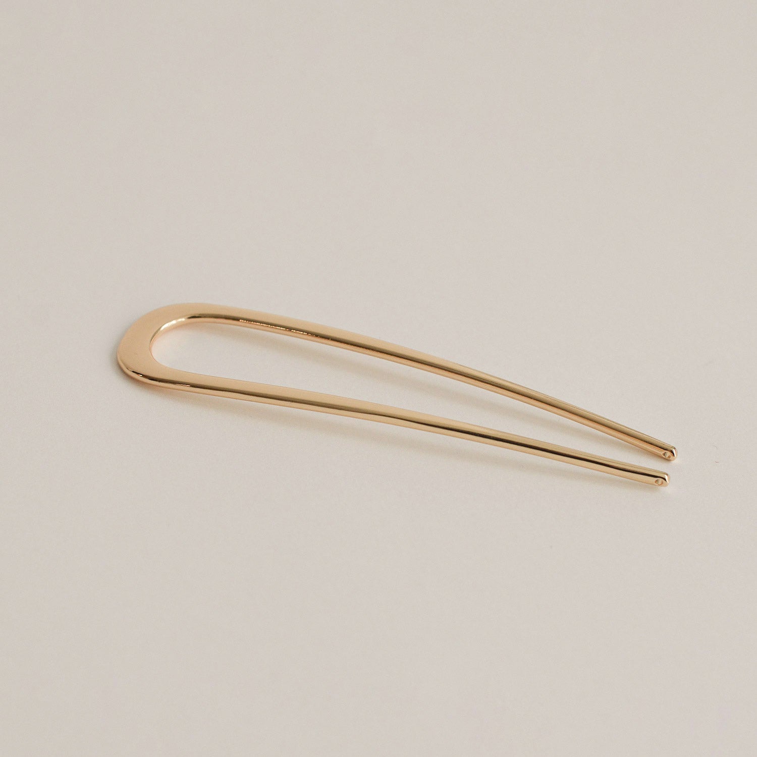 bent u-shaped gold hair stick made of alloy
