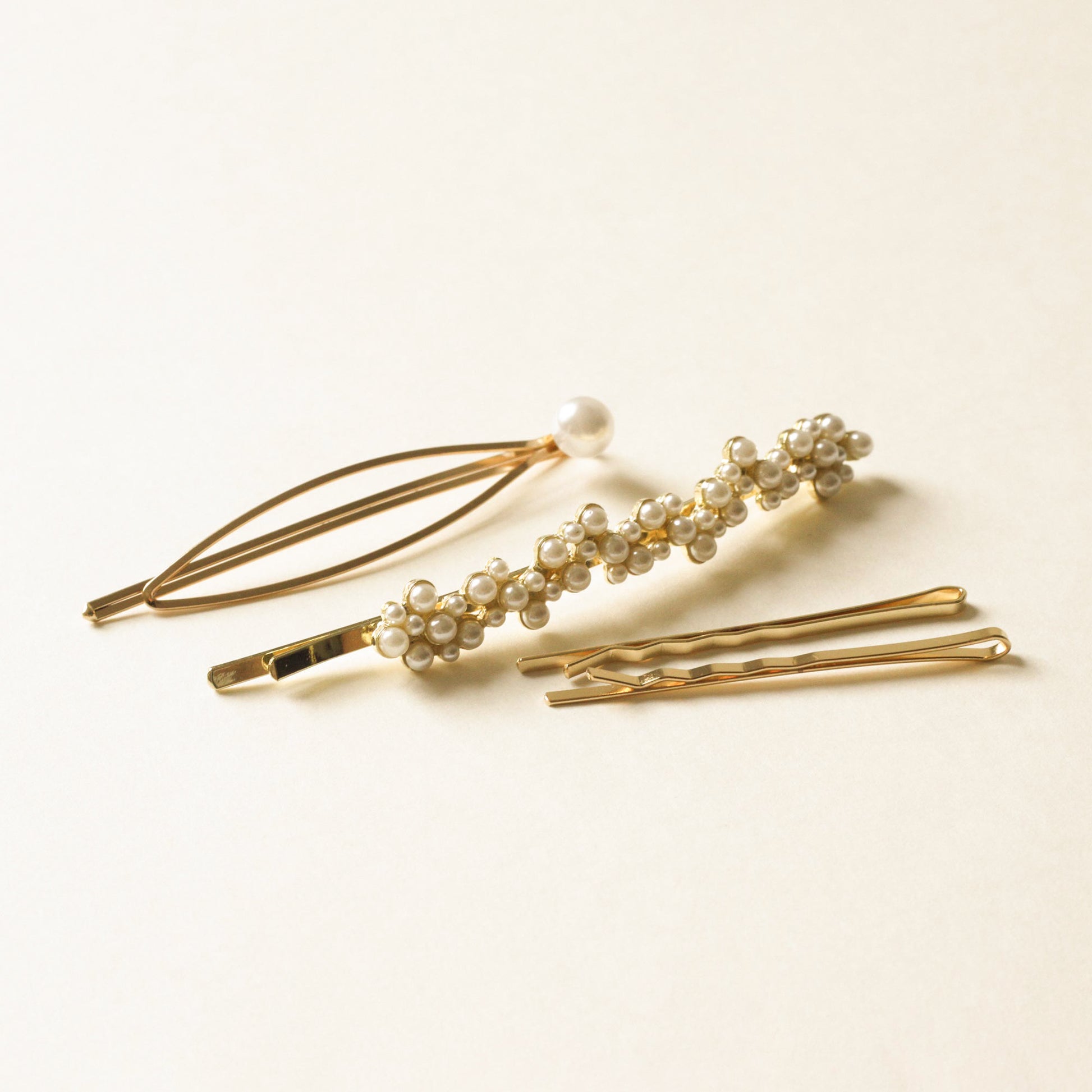 metal bobby pins and with pearl beads