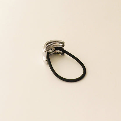 back side of hair tie with silver double cuff