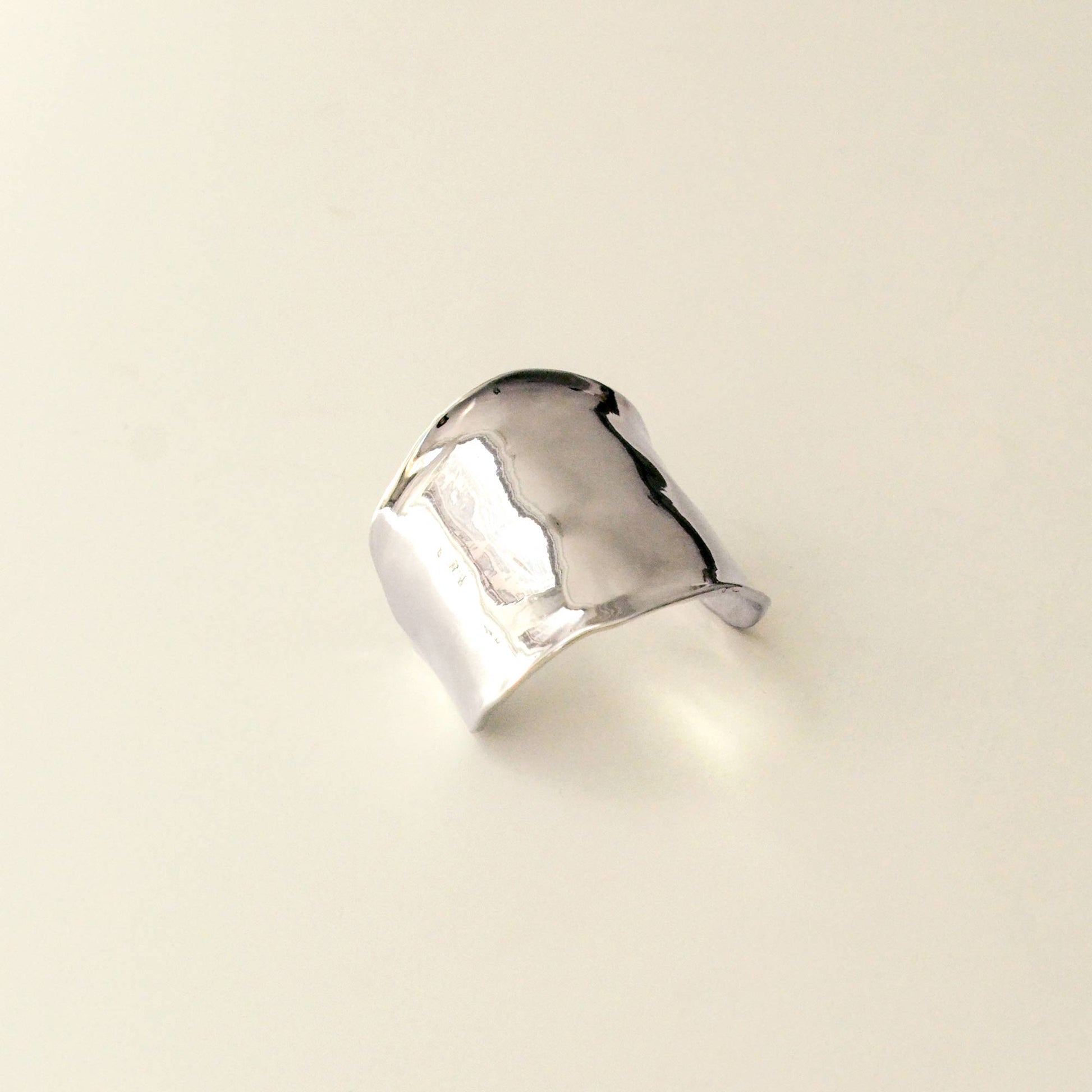 top view of hair cuff holder made of silver