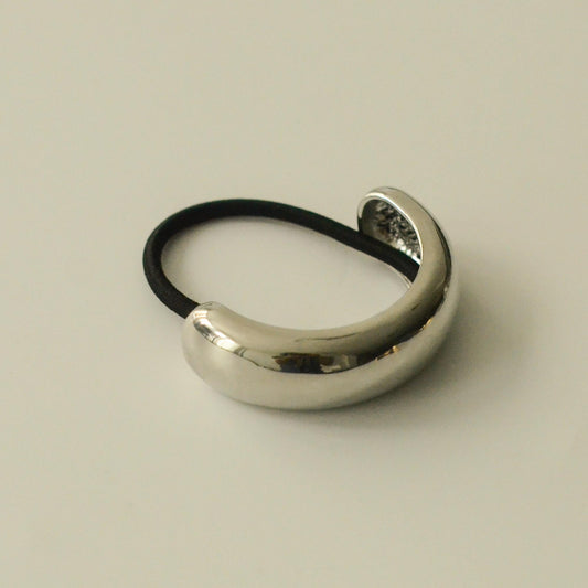 front view of silver metal cuff hair tie