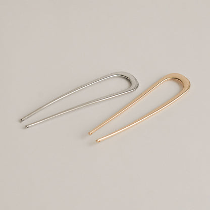 silver and gold bent u-shaped hair sticks